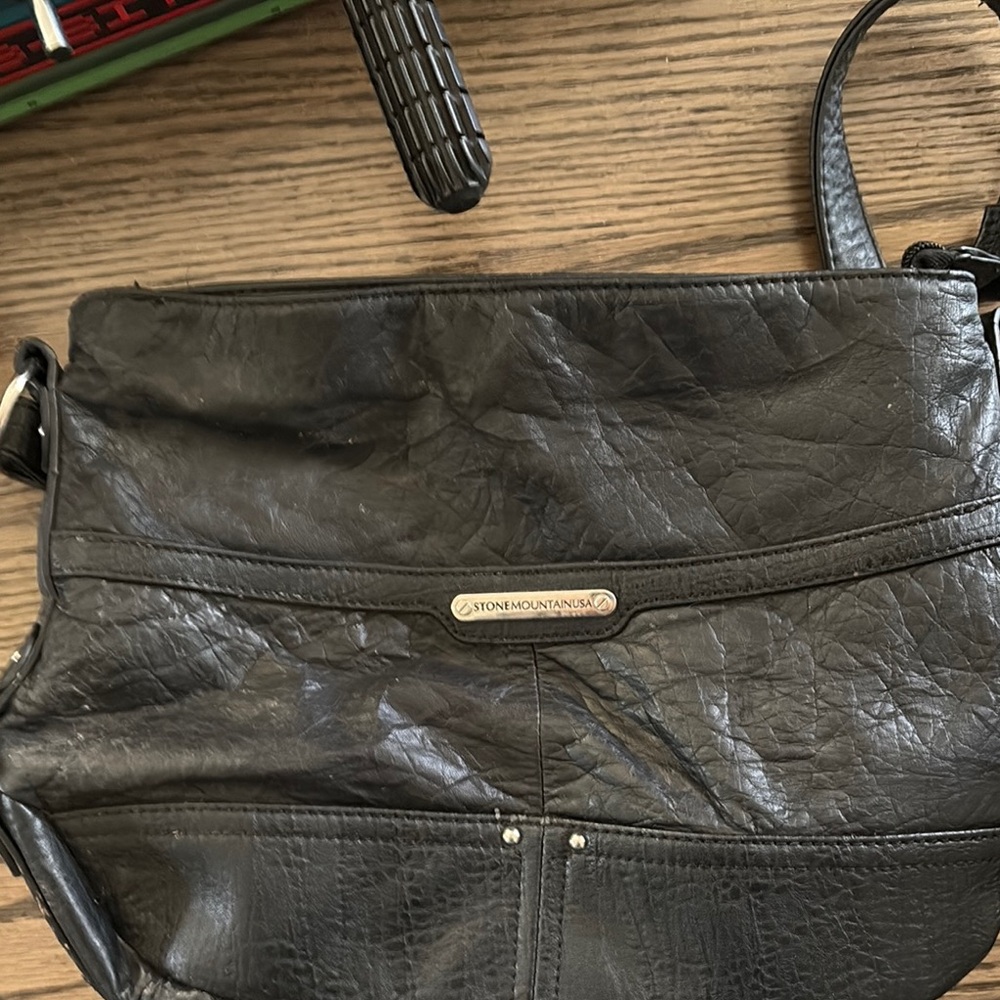 Stone Mountain Accessories Black Crossbody Bag with Flap Closure